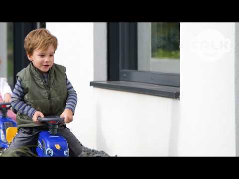 Ride-on traktori peräkärryllä, haravalla ja lapiolla baby New Holland FALK