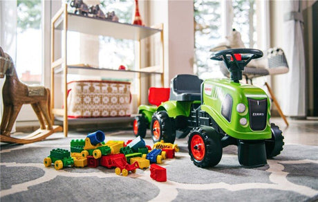 Ride - on traktori peräkärryllä, haravalla ja lapiolla baby Claas FALK - KarelianStore