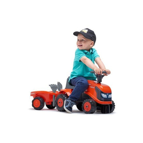 Ride - on traktori peräkärryllä, haravalla ja lapiolla baby Kubota FALK - KarelianStore
