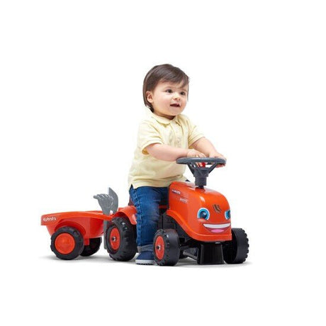 Ride - on traktori peräkärryllä, haravalla ja lapiolla baby Kubota FALK - KarelianStore