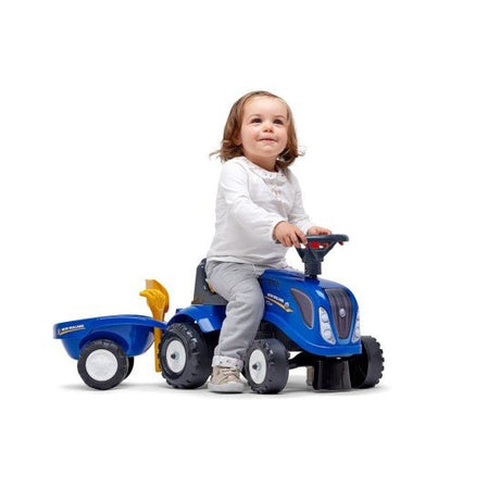 Ride - on traktori peräkärryllä, haravalla ja lapiolla baby New Holland FALK - KarelianStore