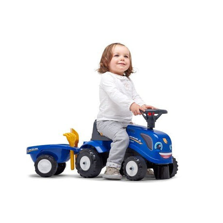 Ride - on traktori peräkärryllä, haravalla ja lapiolla baby New Holland FALK - KarelianStore