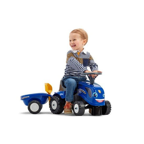 Ride - on traktori peräkärryllä, haravalla ja lapiolla baby New Holland FALK - KarelianStore