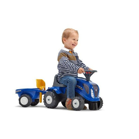 Ride - on traktori peräkärryllä, haravalla ja lapiolla baby New Holland FALK - KarelianStore